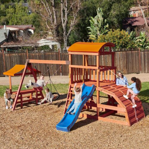 real wood adventures bushy tail burrow outdoor playset with background