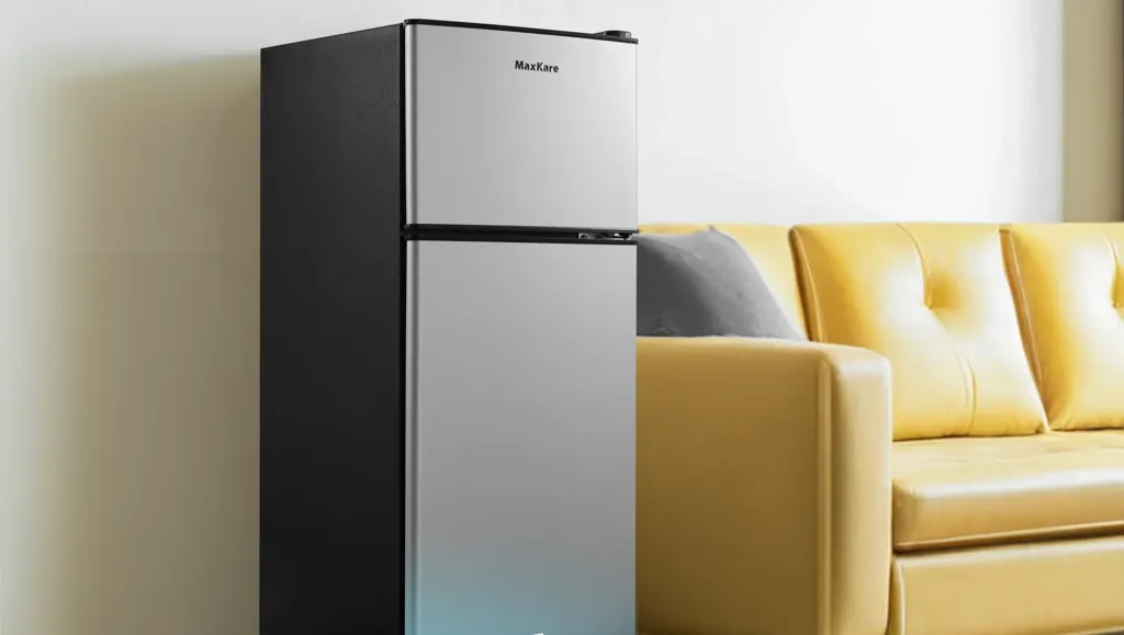 Compact fridge, 1.94 sq. ft., perfect for small spaces.