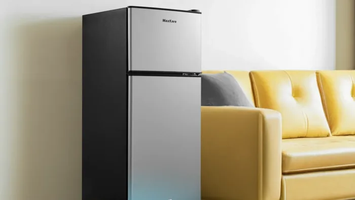Compact fridge, 1.94 sq. ft., perfect for small spaces.