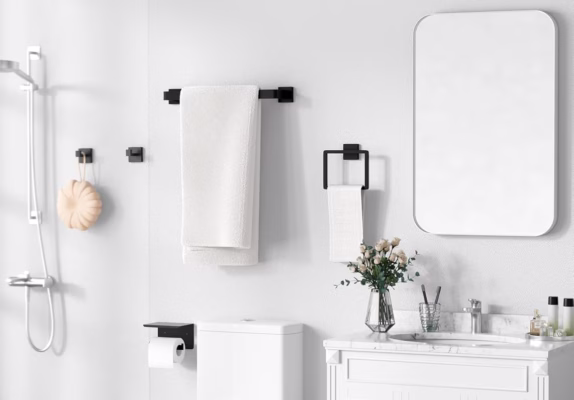 Modern bathroom with white decor and accessories.