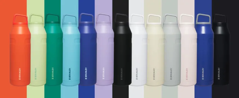 Colorful water bottles lined up in a row.