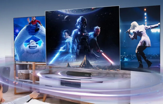 TV displaying movies and concert performance.