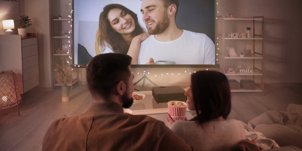 couple watching movie at home