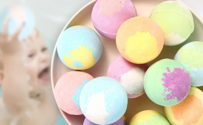 Colorful bath bombs in a bowl