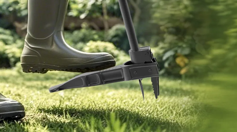 Person using garden tool on lawn