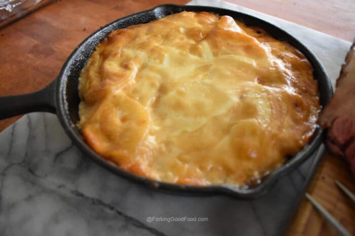 cast iron smoked potatoes au gratin