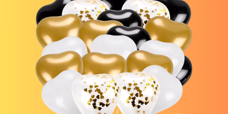 Heart-shaped balloons in gold, black, white.