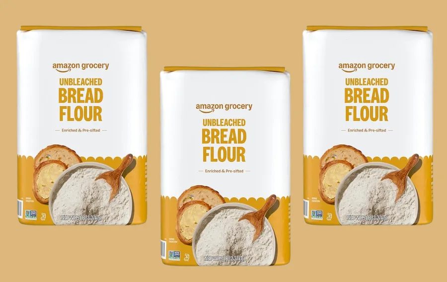 Three packs of unbleached bread flour.