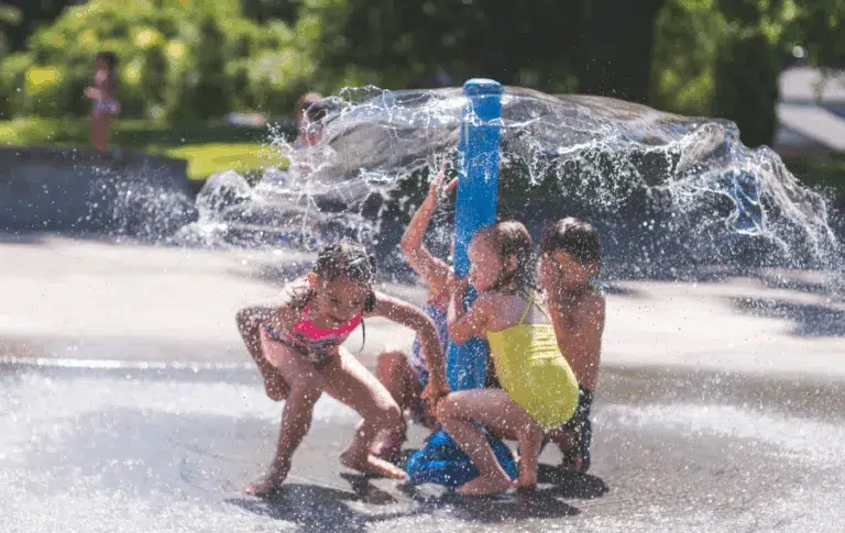 Kids playing in water spray park