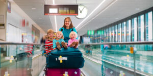 traveling with kids on luggage