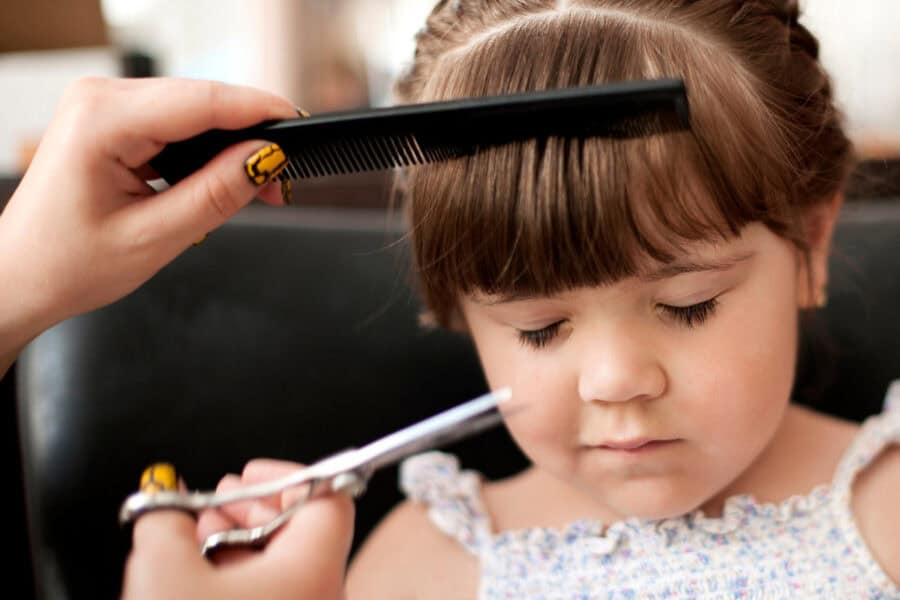 kid getting haircut