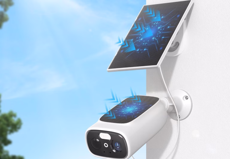 Solar-powered security camera with panel on wall.
