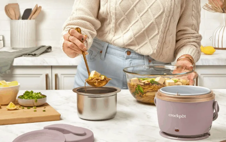 Woman ladling soup into stainless container.