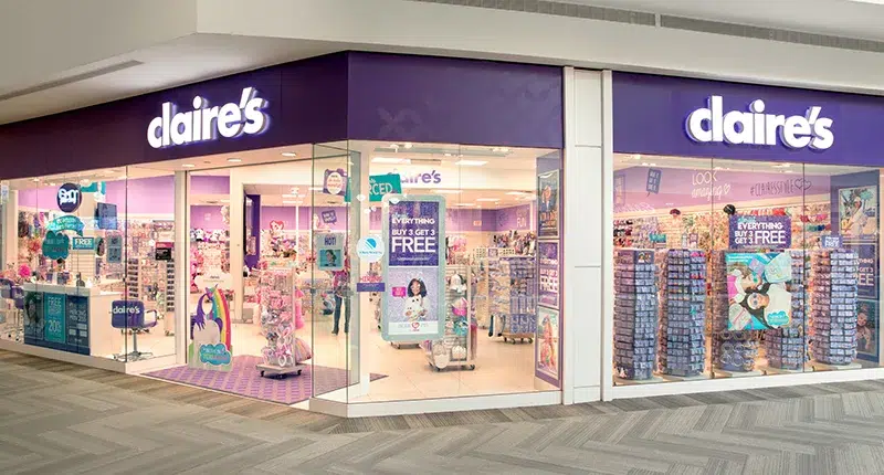 Purple-themed accessory store exterior view.