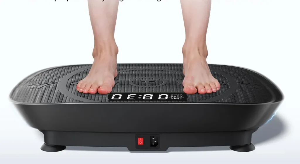 Person using vibration platform for exercise.