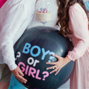 boy or girl gender reveal party with balloons