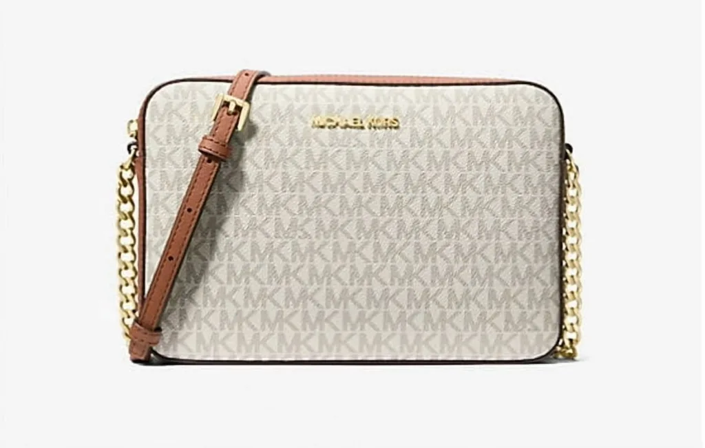 michael kors women s adjustable strap signature coated canvas crossbody bag vanilla 45658e12 ab48 4479 a5a3 c8e05c8a5e73.5898034ec232cd61f8041ffa8bec3c7a