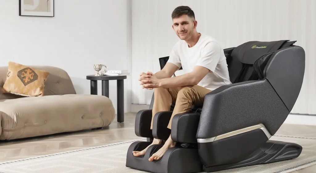 Man sitting on a massage chair in living room.