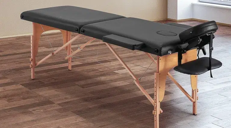 Foldable massage table with black cushioning