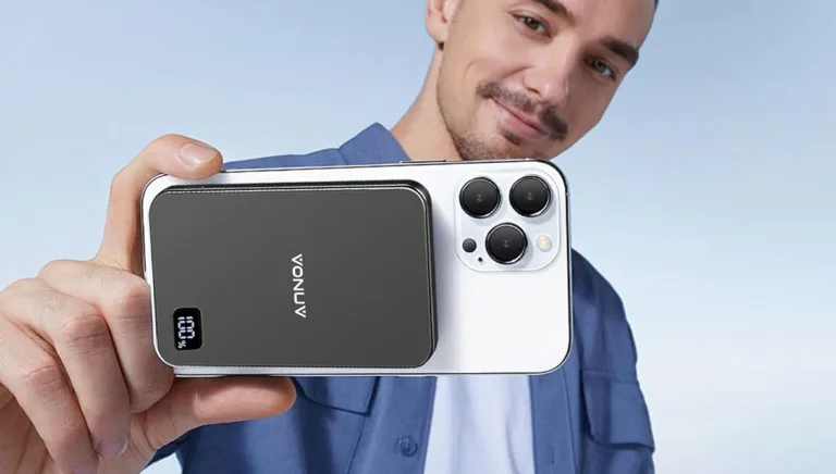 Person holding phone with attached portable battery