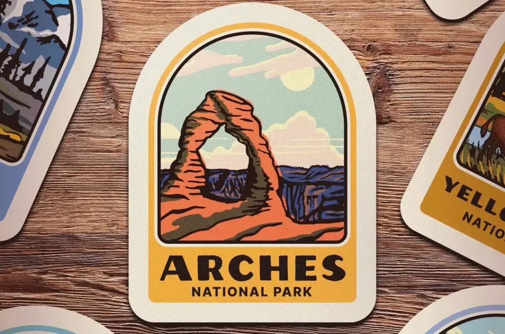 Arches National Park sticker on wooden table