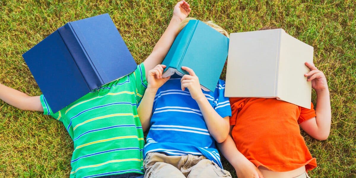 kids reading summer outside