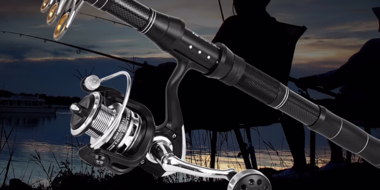 Fishing rod by lake at sunset