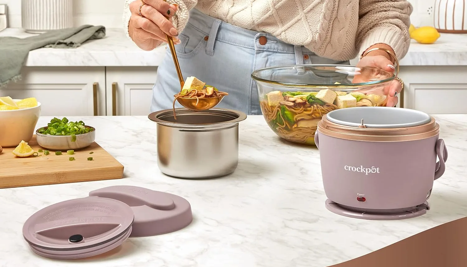 Preparing soup with Crock-Pot on kitchen counter.