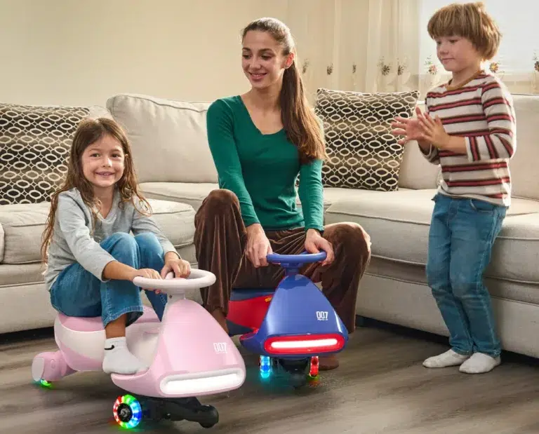Family playing on colorful ride-on toys indoors.