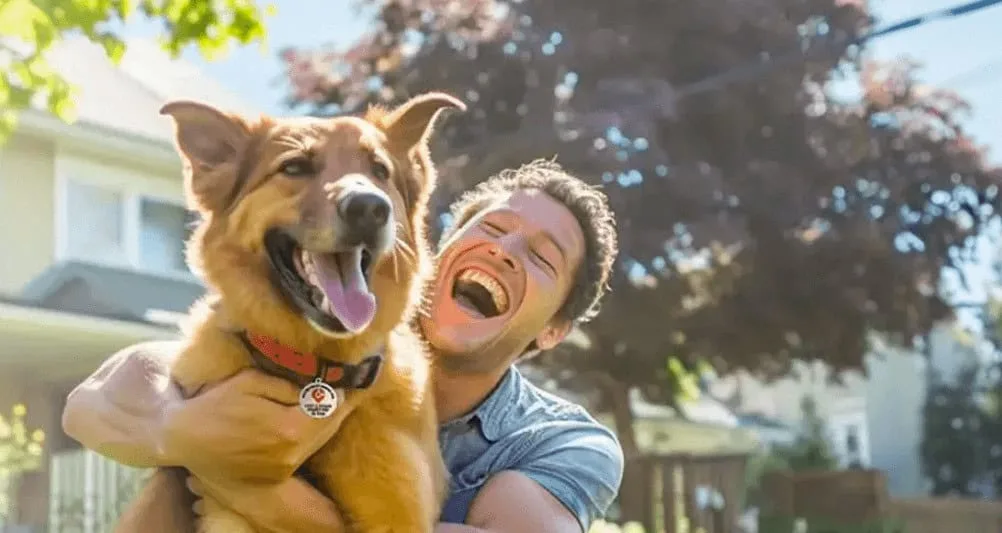 Man laughing with happy dog in backyard.