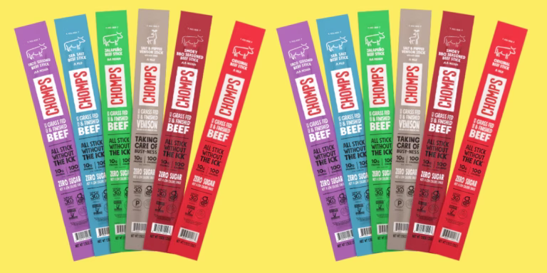 Variety of Chomps beef sticks on yellow background.