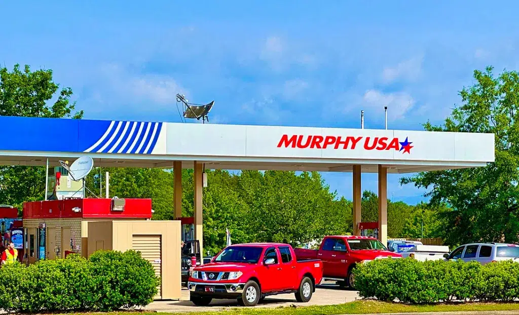 Murphy USA gas station with red truck parked.