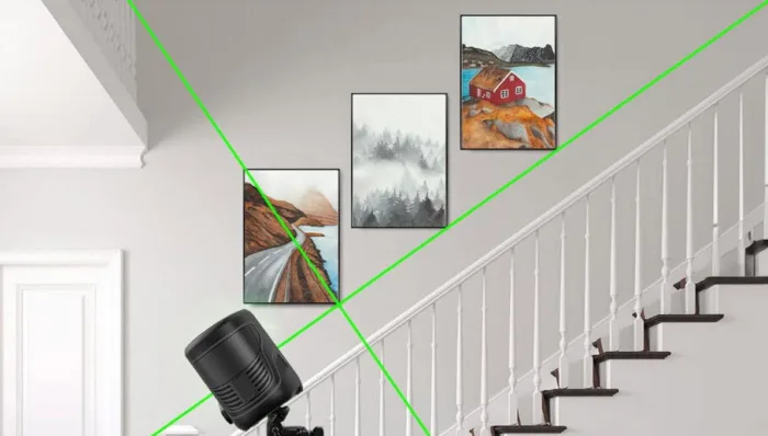 Wall art aligned along stairway in house