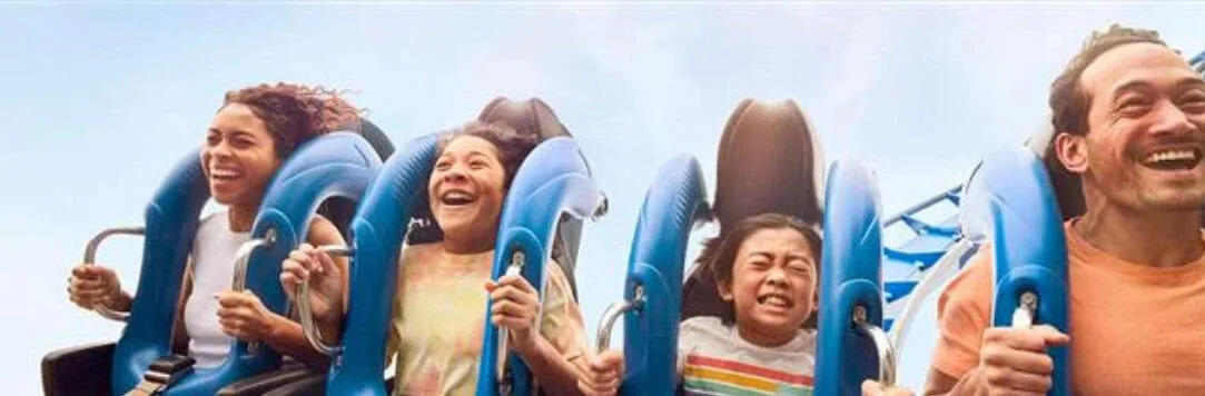 People enjoying a thrilling roller coaster ride.