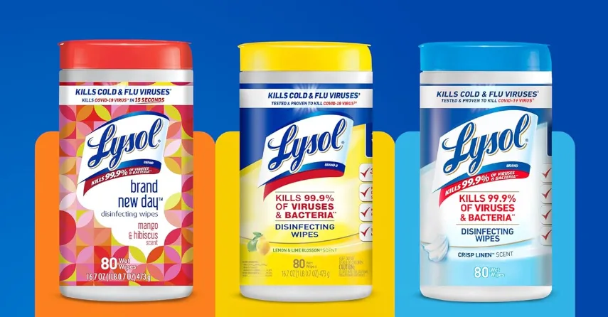Three Lysol disinfecting wipe containers in different scents.