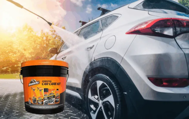 Car being washed with Armor All kit.