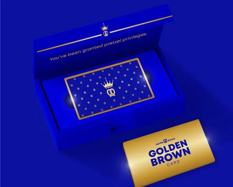 Golden Brown pretzel privilege card in blue box.
