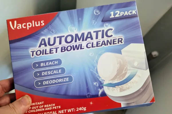 Toilet bowl cleaner package with bleach tablets.