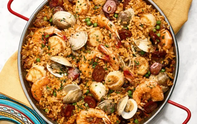 Traditional seafood paella with shrimp and clams