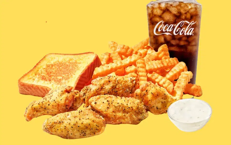 Fried chicken meal with fries and drink.