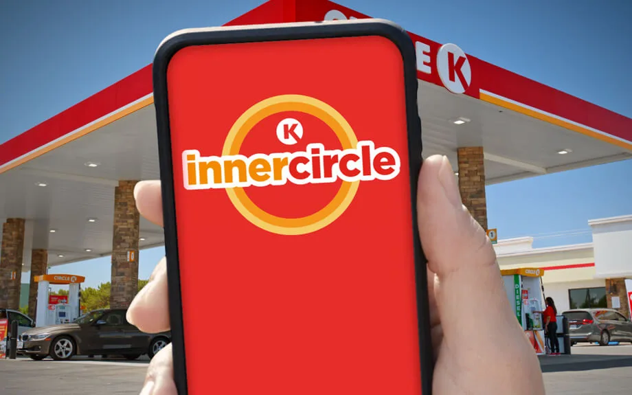 Phone displaying Circle K innercircle app at gas station.