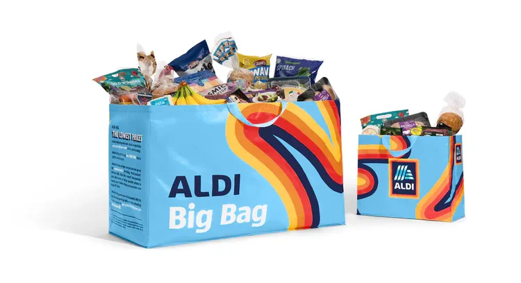Aldi Big Bag filled with assorted groceries.
