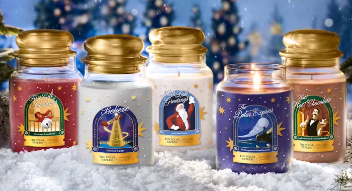 Polar Express themed candles in snowy setting.