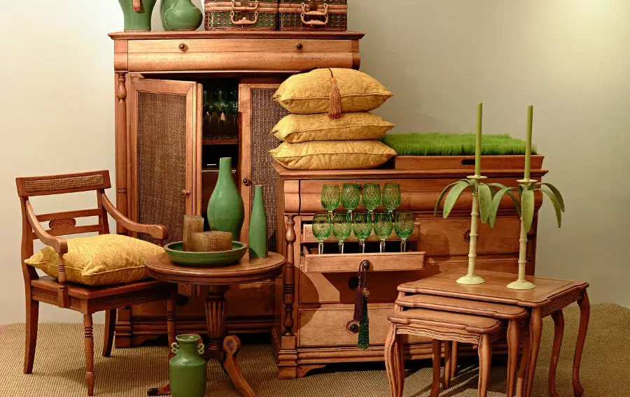 Rustic furniture with green decor and candles