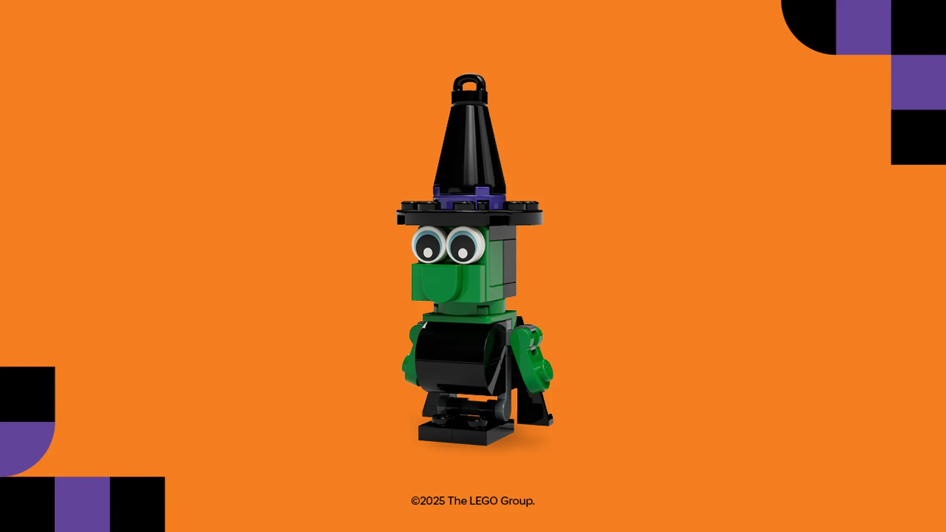 LEGO witch figurine on orange background