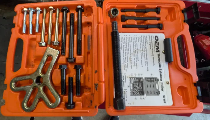 Harmonic balancer puller kit in orange case.