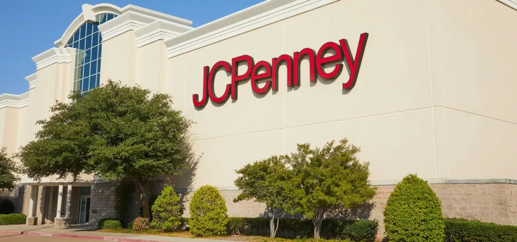 JCPenney store exterior with logo and trees.