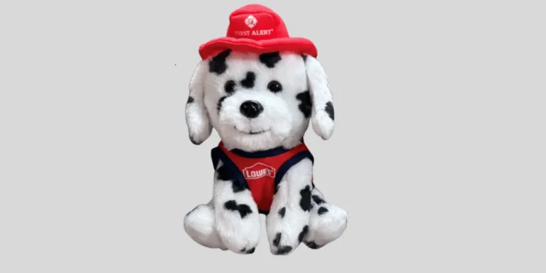 Dalmatian plush toy in firefighter outfit