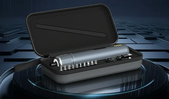 Cordless screwdriver set with case on a dark background.