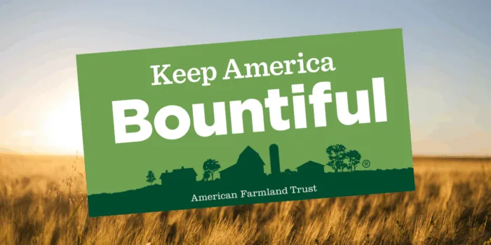 American Farmland Trust logo in wheat field background.